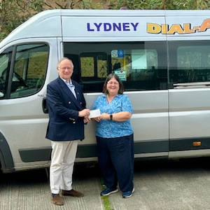 Louise receiving a cheque